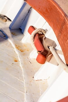 Fragmentary view details of knots and ropes on the yacht moored in the dock