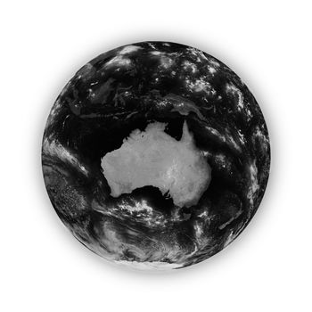 Australia on dark planet Earth isolated on white background. Highly detailed planet surface. Elements of this image furnished by NASA.