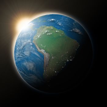 Sun over South America on blue planet Earth isolated on black background. Highly detailed planet surface. Elements of this image furnished by NASA.