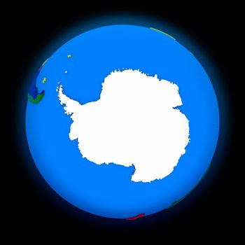 Antarctica on political globe on black background