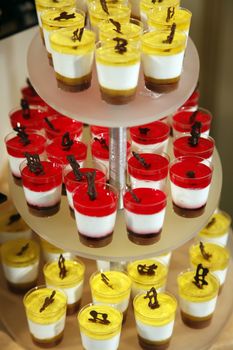 Colorful desserts and pastry served on a wedding party