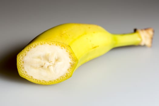 Sliced Banana Close Up on grey background.
