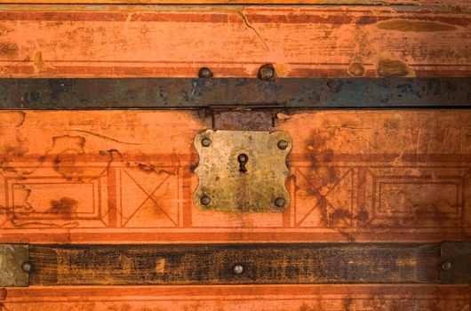 Vintage Chest Lock Closeup. Aged Wooden Chest Photo Background.