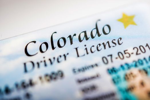 Colorado Driver License Closeup Photo. Colorado Transportation Law