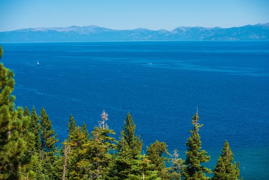 Lake Tahoe Summer Panorama. Clear Blue Water of the Lake Tahoe  in California Sierra Nevada Mountains, USA.