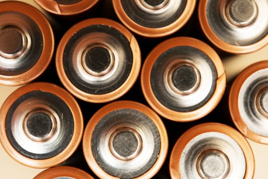 AA Batteries Top Closeup Photo. Mobile Power Source.