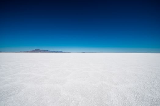 Salt Flats in Utah. Salt Flats Landscape. Dark Blue Sky and Snow White Salt Soil. Boneville near Salt Lake City, Utah, United States. Bonneville Salt Flats