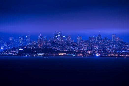 San Francisco Night Panorama. San Francisco Skyline and the Bay at Night. California, United States.