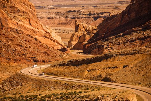 Rocky Desert Utah Highway with Semi Trucks. Scenic Utah Interstate Highway I-70. United States.