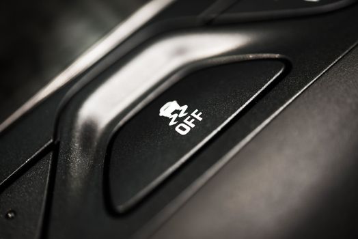 Traction Control Off Button Closeup. Traction Control in Car System. Safety Car Feature.