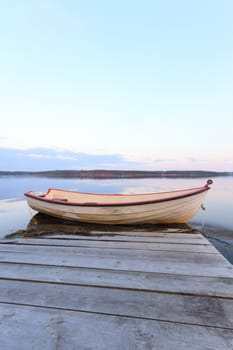 boat on the blue lake with cloudy sky, nature series