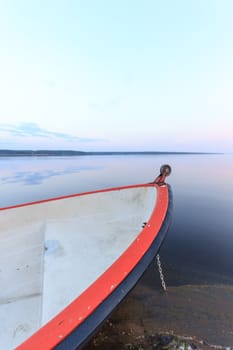 boat on the blue lake with cloudy sky, nature series