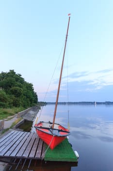 boat on the blue lake with cloudy sky, nature series