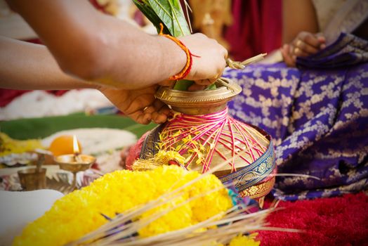 Traditional Indian Hindu religious praying items in ear piercing ceremony for children. India special rituals heritage.