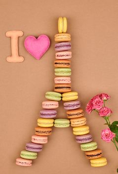 Macarons. Still life. I love Eiffel Tower french sweet colorful, pink heart, roses. Fresh pastel delicious biscuit dessert chocolate retro vintage background                                          