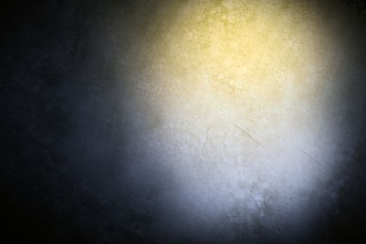Grey wall background with yellow light, wallpaper
