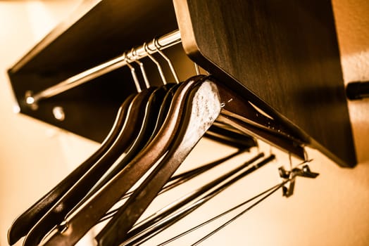 Empty Wood Clothes Hangers Closeup.