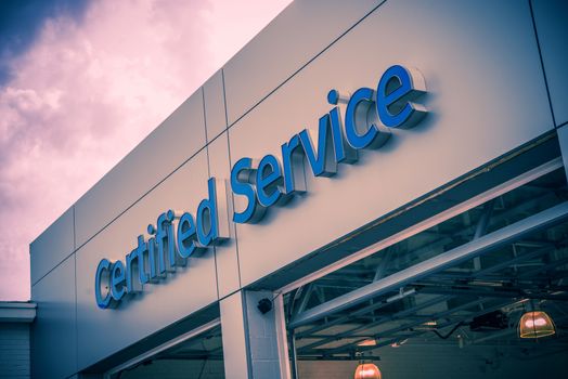 Certified Car Service Gates and Large Entrance Sign. Auto Service Theme.
