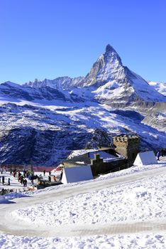 The most beautiful Swiss Alps, Matterhorn in Zermatt with snow walking path, Switzerland.