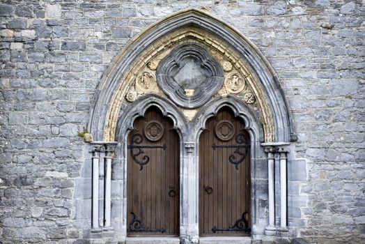 double arched wooden doors in to St Canice’s Cathedral kilkenny ireland