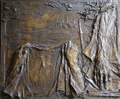 Veil of Veronica, detail on the door of the church of St. James the Greater in Porto Azzurro, Elba, Italy