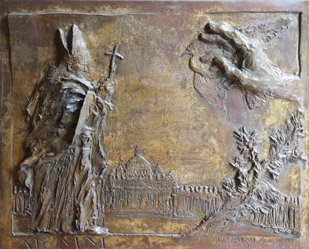 Pope John Paul II, Relief on the bronze door of the church of St. James the Greater in Porto Azzurro, Elba, Italy