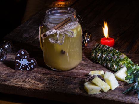 Concept green pineapple tea on wooden table