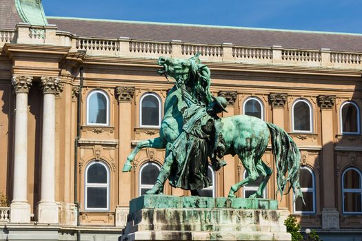 Statue of the Csikos (Hungarian horse wrangler) in the court of Buda castle in Budapest Hungary