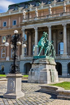 Statue of the Csikos (Hungarian horse wrangler) in the court of Buda castle in Budapest Hungary