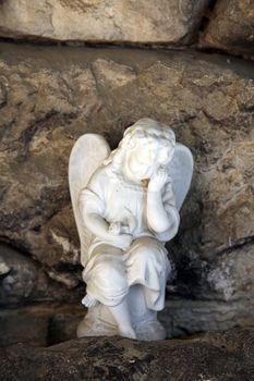 A white mourning porcelain angel at Mirogoj cemetery, Zagreb, Croatia