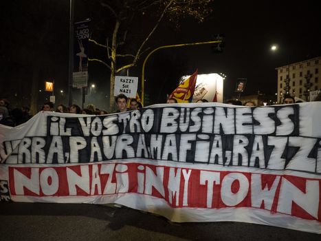 ITALY, Milan: Members of the Anti-Fascist Network of Milan march to protest against the meeting of Italian Secretary of the Northern League Matteo Salvini, French President of the National Front Marine Le Pen, and other officials at MiCo in Milan, Italy on January 28, 2016. Carrying pro-refugee signs, the protesters march through the city and launch fireworks.