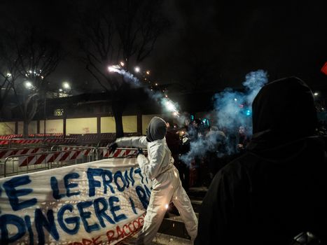 ITALY, Milan: Members of the Anti-Fascist Network of Milan launch fireworks as they protest against the meeting of Italian Secretary of the Northern League Matteo Salvini, French President of the National Front Marine Le Pen, and other officials at MiCo in Milan, Italy on January 28, 2016.