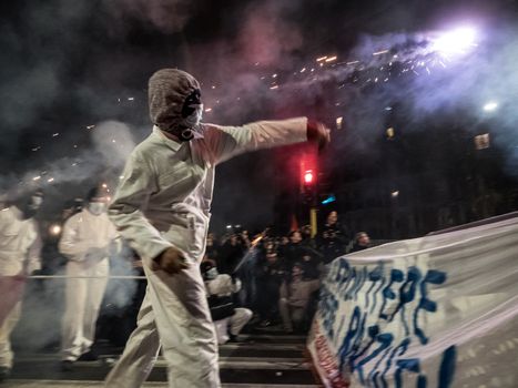 ITALY, Milan: Members of the Anti-Fascist Network of Milan launch fireworks as they protest against the meeting of Italian Secretary of the Northern League Matteo Salvini, French President of the National Front Marine Le Pen, and other officials at MiCo in Milan, Italy on January 28, 2016.