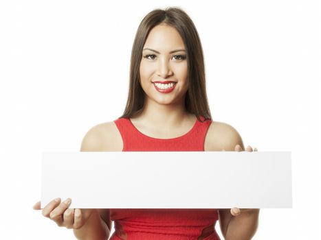 An image of a young asian woman holding a message board