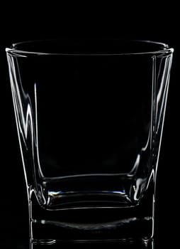 silhouette of square glass for whisky on black background