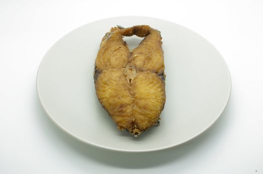 Deep fried fish on dish