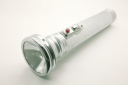 Old metal flashlight, silver torch