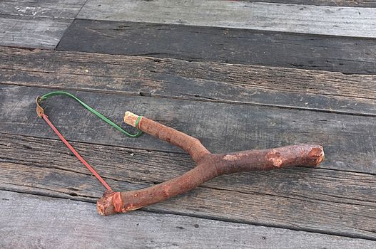 Wooden catapult slingshot, doodle style