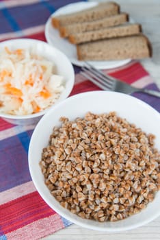 Dinner with the buckwheat cereals and sauerkraut