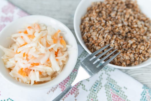 Dinner with the buckwheat cereals and sauerkraut