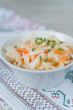 Plate of the sauerkraut with green onion