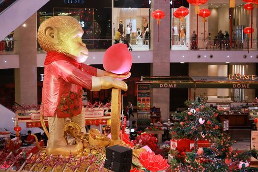 MALAYSIA, Kuala Lumpur: A picture is taken of the huge monkey installed in the middle of the Pavilion shopping centre in Kuala Lumpur, Malaysia for the Chinese Lunar New Year celebrations on January 29, 2016.  This year the Chinese New Year will be celebrated on February 8, 2016.  