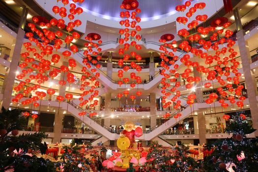 MALAYSIA, Kuala Lumpur: A picture is taken of the huge monkey installed in the middle of the Pavilion shopping centre in Kuala Lumpur, Malaysia for the Chinese Lunar New Year celebrations on January 29, 2016.  This year the Chinese New Year will be celebrated on February 8, 2016.  