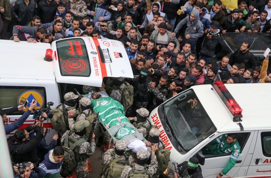 GAZA STRIP, Gaza City: Palestinian Hamas militants carry the body of one of the seven Hamas militants killed after a tunnel, built for fighting Israel, collapsed in the Gaza Strip, during their funeral in Gaza City on January 29, 2016.The Ezzedine Al-Qassam Brigades, Hamas's armed wing, said that four militants managed to escape after the collapse late on January 26 in the northeast of the strip.