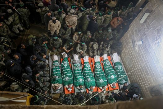 GAZA STRIP, Gaza City: Palestinians pray in front of the bodies of seven Hamas militants who were killed after a tunnel built for fighting Israel collapsed in the Gaza Strip, during their funeral in Gaza City on January 29, 2016.The Ezzedine Al-Qassam Brigades, Hamas's armed wing, said that four militants managed to escape after the collapse late on January 26 in the northeast of the strip.  