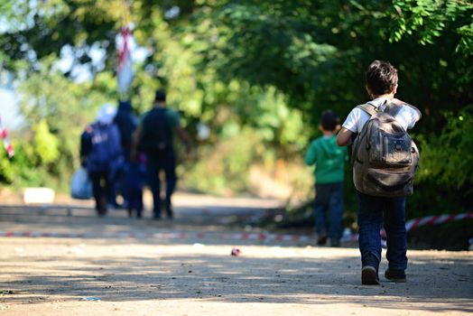 October 6,2015; Hegyeshalom in Hungary. Group of refugees leaving Hungary. They came to Hegyeshalom by train and then they leaving Hungary and go to Austria and then to Germany. Many of them escapes from home because of civil war. 