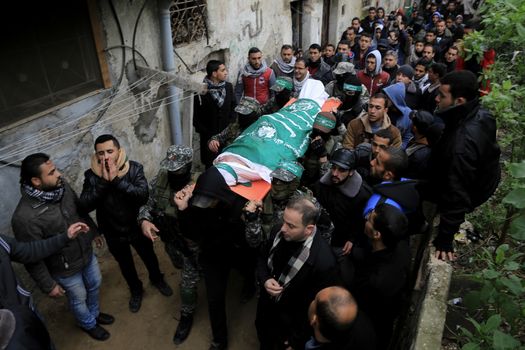 GAZA STRIP, Gaza City: Mourners carry the bodies of one of the seven Palestinian Hamas gunmen who were killed when a tunnel collapsed close to the Gaza Strip's eastern border with Israel during their funeral in Gaza City, January 29, 2016. The Ezzedine Al-Qassam Brigades, Hamas's armed wing, said that four militants managed to escape after the collapse late on January 26 in the northeast of the strip. Palestinian militants have used tunnels on Gaza's borders with Israel and Egypt to launch attacks on Israel, transport weapons or smuggle goods.