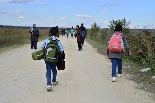 October 4, 2015; Sid in Serbia. Group of Afghan refugees leaving Serbia. They came to Sid by taxi and then they leaving Serbia and go to Croatia and then to Germany. Many of them escapes from home because of civil war. 