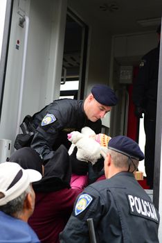 October 6,2015; Hegyeshalom in Hungary. Group of refugees leaving Hungary. They came to Hegyeshalom by train and then they leaving Hungary and go to Austria and then to Germany. Many of them escapes from home because of civil war. 