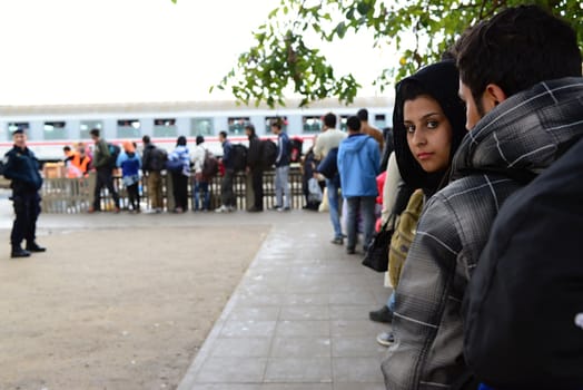 October 6,2015; Hegyeshalom in Hungary. Group of refugees leaving Hungary. They came to Hegyeshalom by train and then they leaving Hungary and go to Austria and then to Germany. Many of them escapes from home because of civil war. 